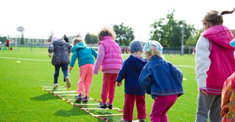 Kids - Children's Team Building on Green Grassland