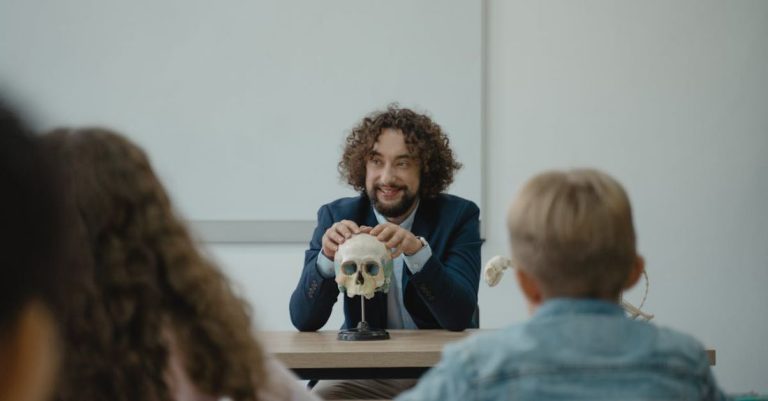 Study - Teacher Showing His Class a Human Skull