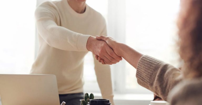 Agreements - Man and Woman Near Table